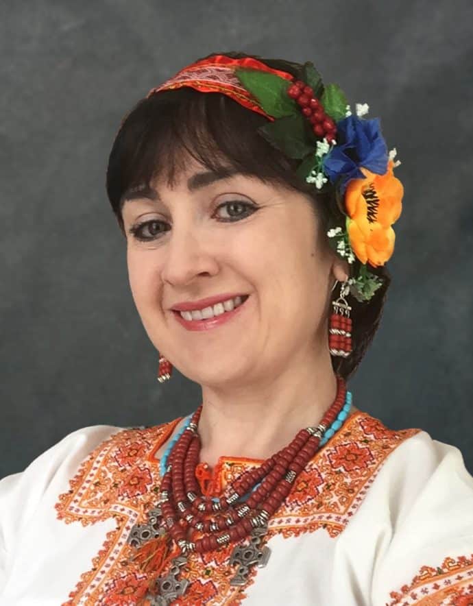 A woman wearing classical national cloth of Ukraine.